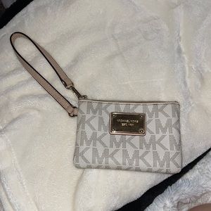 Small logo Micheal Kors wristlet!